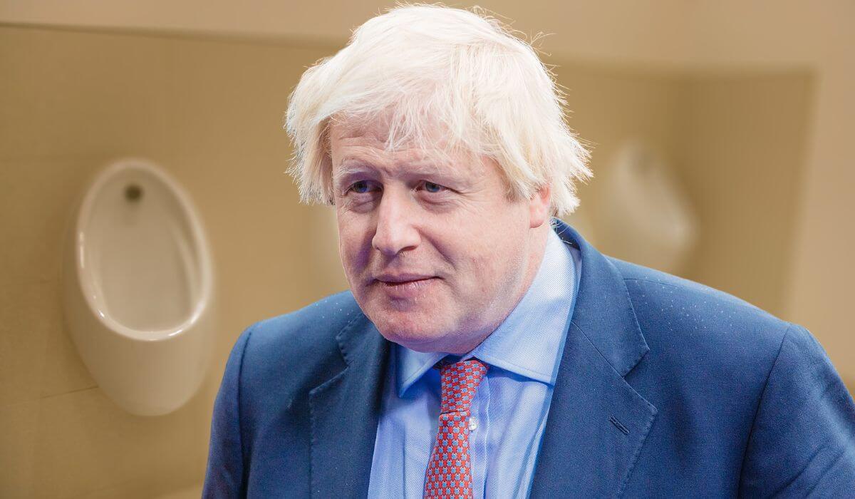 Picture of Boris Johnson by a urinal
