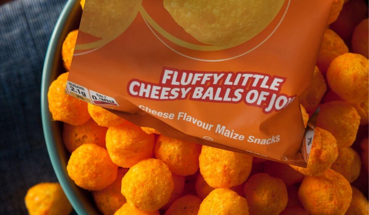 A bag od cheesy balls with the description, fluggy little cheesy balls of joy.